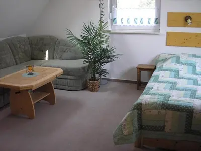 Ein Sitzbereich in der Unterkunft Ferienwohnung Möwe