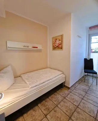 Ein Bett oder Betten in einem Zimmer der Unterkunft Neue Liebe - Wohnung 1
