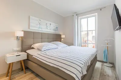 Ein Bett oder Betten in einem Zimmer der Unterkunft Whg 12 Viktoria Luna Ostseeflair