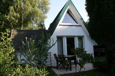 Ein Garten an der Unterkunft Strandstübchen