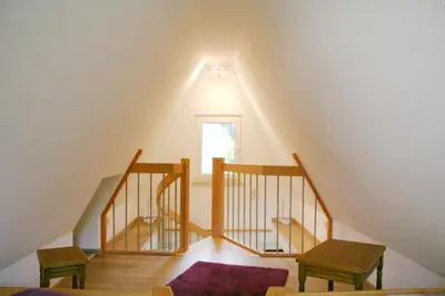 Ein Bett oder Betten in einem Zimmer der Unterkunft Strandstübchen