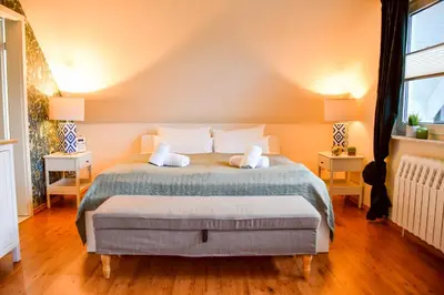 Ein Bett oder Betten in einem Zimmer der Unterkunft KOCHWERK Restaurant & Pension