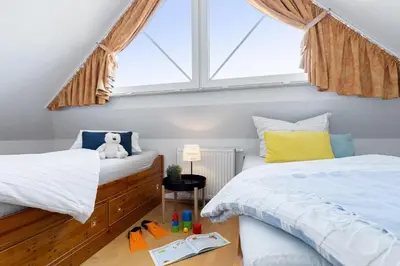 Ein Bett oder Betten in einem Zimmer der Unterkunft Alte Reihe 14 