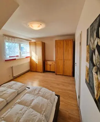 Ein Bett oder Betten in einem Zimmer der Unterkunft Strandstr.