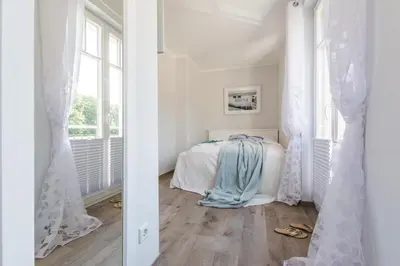 Ein Bett oder Betten in einem Zimmer der Unterkunft Sonne und Meer