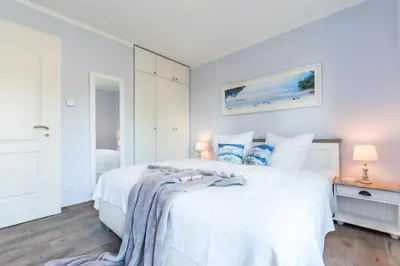 Ein Bett oder Betten in einem Zimmer der Unterkunft Sonne und Meer