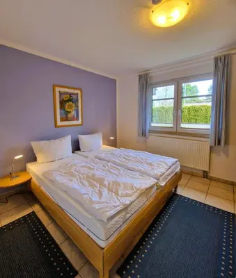 Ein Bett oder Betten in einem Zimmer der Unterkunft Hägerende 10/ Wohng.2 