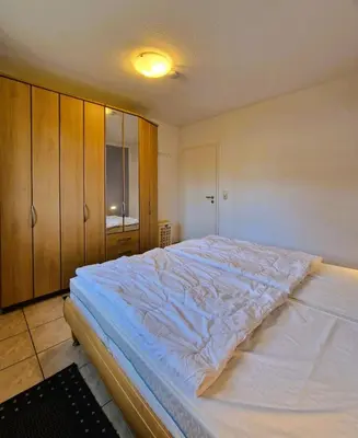 Ein Bett oder Betten in einem Zimmer der Unterkunft Hägerende 10/ Wohng.2 