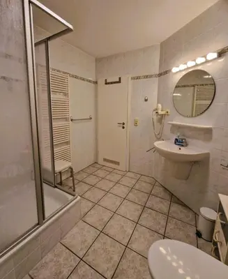 Ein Badezimmer in der Unterkunft Hägerende 10/ Wohng.2 