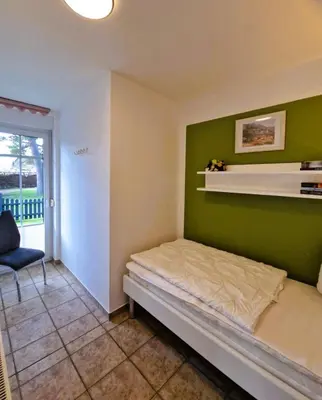 Ein Bett oder Betten in einem Zimmer der Unterkunft Hägerende 10/ Wohng.2 