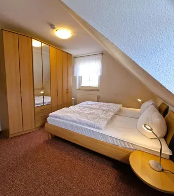 Ein Bett oder Betten in einem Zimmer der Unterkunft 