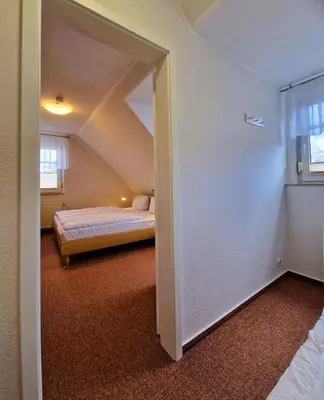 Ein Bett oder Betten in einem Zimmer der Unterkunft 