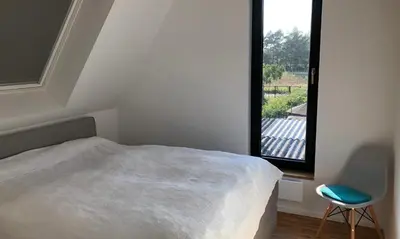Ein Bett oder Betten in einem Zimmer der Unterkunft -