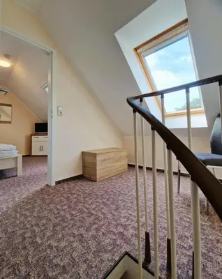 Ein Bett oder Betten in einem Zimmer der Unterkunft Neue Liebe Wohng.4