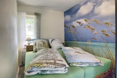 Ein Bett oder Betten in einem Zimmer der Unterkunft Seelavie