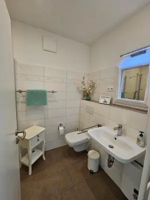 Ein Badezimmer in der Unterkunft LeinenLos im Kajüting