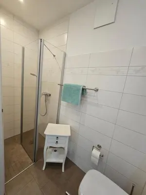 Ein Badezimmer in der Unterkunft LeinenLos im Kajüting