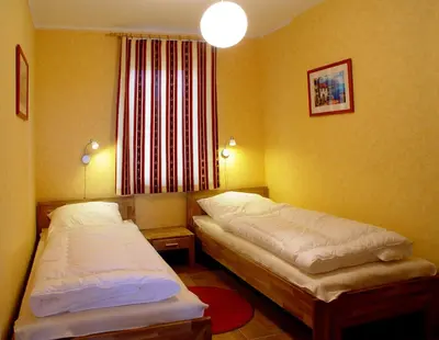 Ein Bett oder Betten in einem Zimmer der Unterkunft La Mer - Ferienwohnungen