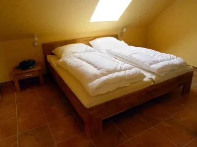 Ein Bett oder Betten in einem Zimmer der Unterkunft La Mer - Ferienwohnungen