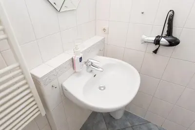 Ein Badezimmer in der Unterkunft Hotel Garni Am Deich