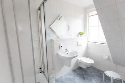 Ein Badezimmer in der Unterkunft Hotel Garni Am Deich