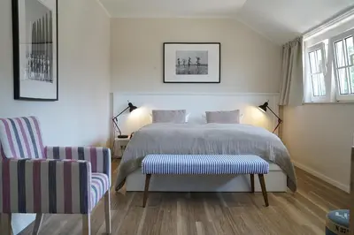 Ein Bett oder Betten in einem Zimmer der Unterkunft Strandhaus Ahrenshoop