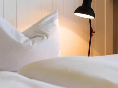 Ein Bett oder Betten in einem Zimmer der Unterkunft Strandhaus Ahrenshoop