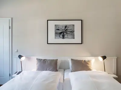 Ein Bett oder Betten in einem Zimmer der Unterkunft Strandhaus Ahrenshoop