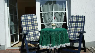 Ein Sitzbereich in der Unterkunft Haus Strandeck