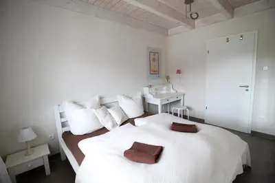 Ein Bett oder Betten in einem Zimmer der Unterkunft Penthouse 