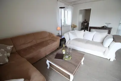 Ein Sitzbereich in der Unterkunft Penthouse 