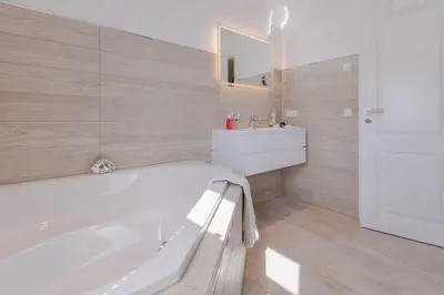 Ein Badezimmer in der Unterkunft Birkmaase 1 a 