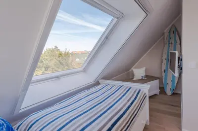 Ein Bett oder Betten in einem Zimmer der Unterkunft Birkmaase 1 a 