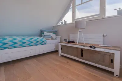 Ein Bett oder Betten in einem Zimmer der Unterkunft Birkmaase 1 a 