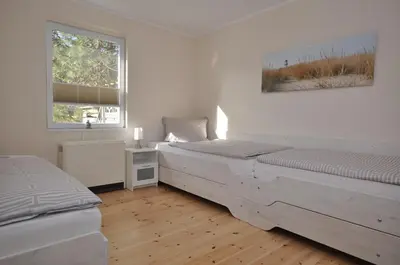 Ein Bett oder Betten in einem Zimmer der Unterkunft Haus Steffchen - Gemütliche Auszeit nahe der Ostsee