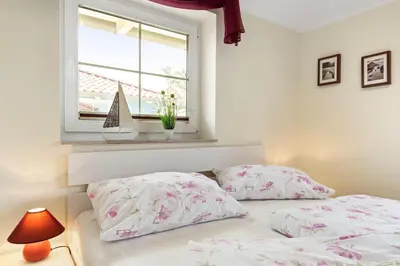 Ein Bett oder Betten in einem Zimmer der Unterkunft Am Bahndamm 