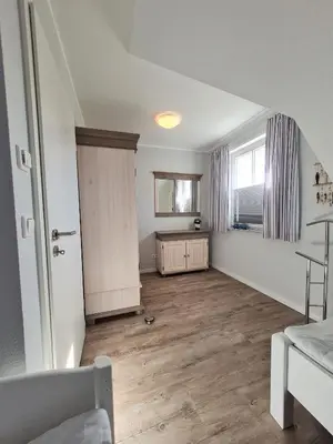 Ein Bett oder Betten in einem Zimmer der Unterkunft Am Paalen