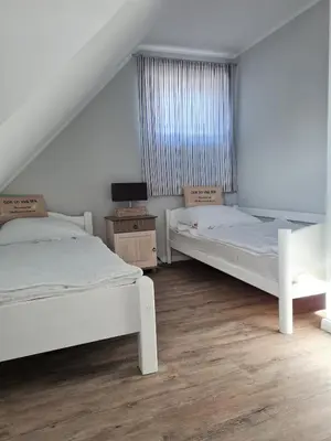 Ein Bett oder Betten in einem Zimmer der Unterkunft Am Paalen