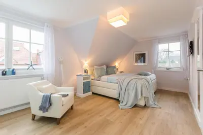 Ein Bett oder Betten in einem Zimmer der Unterkunft Barther Str.10 