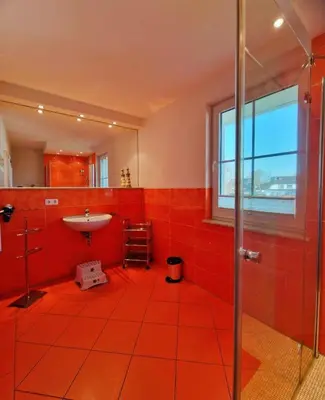Ein Badezimmer in der Unterkunft Strandstr.