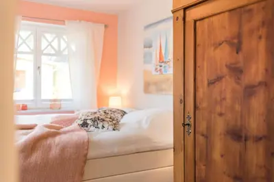 Ein Bett oder Betten in einem Zimmer der Unterkunft Buten un Binnen