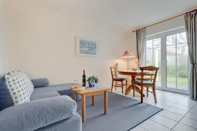 Ein Sitzbereich in der Unterkunft Am Ostseestrand 1
