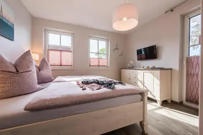 Ein Bett oder Betten in einem Zimmer der Unterkunft Viktoria Luna WE 8 Küstenzauber
