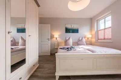 Ein Bett oder Betten in einem Zimmer der Unterkunft Viktoria Luna WE 8 Küstenzauber