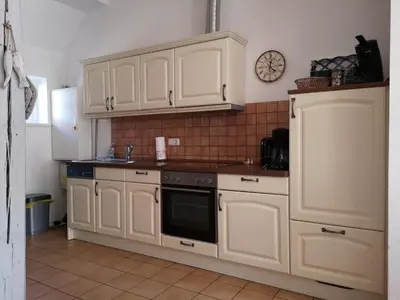Küche/Küchenzeile in der Unterkunft Hafenstr. 41 A Haus Marienlinde