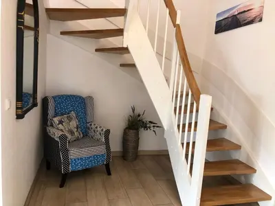 Ein Sitzbereich in der Unterkunft Friedenstrasse Haus Kranich