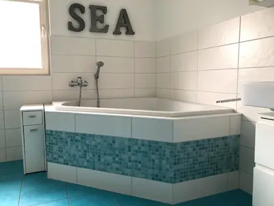 Ein Badezimmer in der Unterkunft Kavelweg Haus JENNY