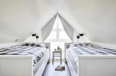 Ein Bett oder Betten in einem Zimmer der Unterkunft Schwedenglück Prerow