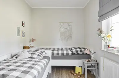 Ein Bett oder Betten in einem Zimmer der Unterkunft Schwedenglück Prerow