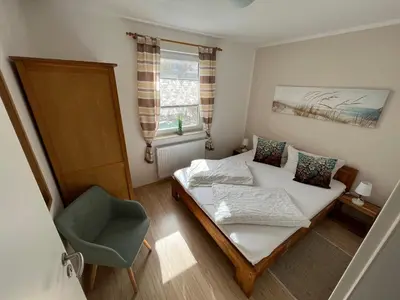 Ein Bett oder Betten in einem Zimmer der Unterkunft Ferienwohnung Sonnenschein